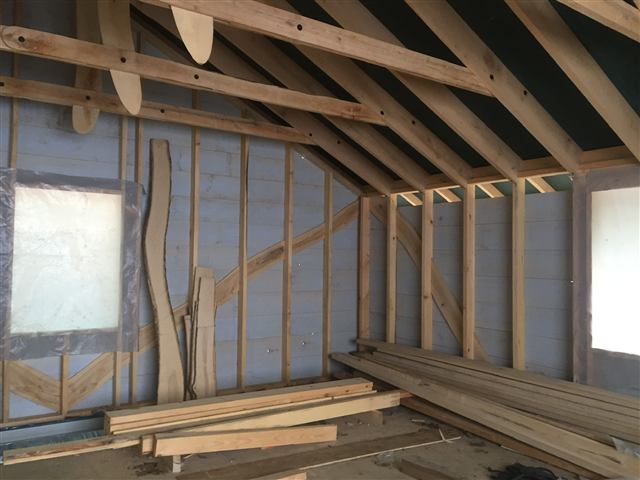 Rafters and wall framing during construction