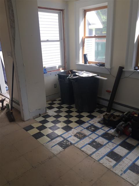 Old checkerboard floor before a remodel